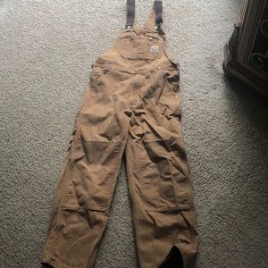Carhartt overalls.
